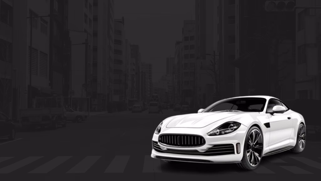 A sleek white luxury sports car is parked on a city street with a dark, moody urban background, creating a striking contrast.